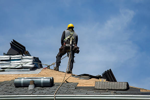 Professional Gutter Installation technician working in Wellston, MI